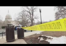 Officers arrest 18-year-old wearing tactical vest, carrying