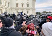 A tense standoff between protesters and police at a demonstration