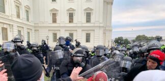 A tense standoff between protesters and police at a demonstration