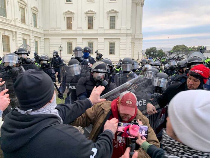 A tense standoff between protesters and police at a demonstration