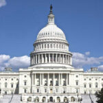 EXPULSION Push: Congress in Unprecedented Crisis U.S. Capitol building against blue sky.