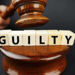 Guilty Plea Shatters Long Island Horror A gavel striking down next to wooden blocks spelling 'GUILTY'