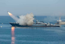 Ceasefire Breached! U.S. Self Defense Strikes Spark Chaos Warship firing missile in the sea.