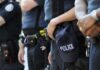 Court Dropkicks Stop‑And‑Frisk Presumption Group of police officers in uniform standing together with a police cap visible
