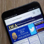 DEA website open on smartphone screen.