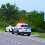 From Obama’s Pick To Felony Peril Police car pulling over a white car