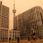 Toronto Chokes: World’s Worst Air Today LIVE: View of downtown Toronto as wildfire smoke blankets city