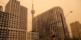 LIVE: View of downtown Toronto as wildfire smoke blankets city