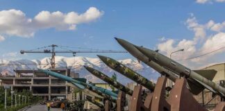 Row of missiles on display outdoors