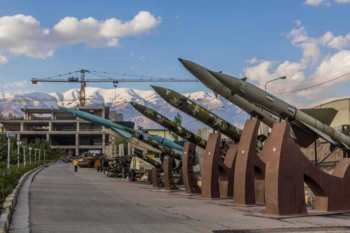 Row of missiles on display outdoors