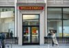 Wells Fargo bank branch entrance on a city street