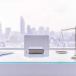law office desk with laptop book and scales of justice