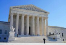 Russian Ruse Exploits Voter Files Supreme Court building with grand columns and steps